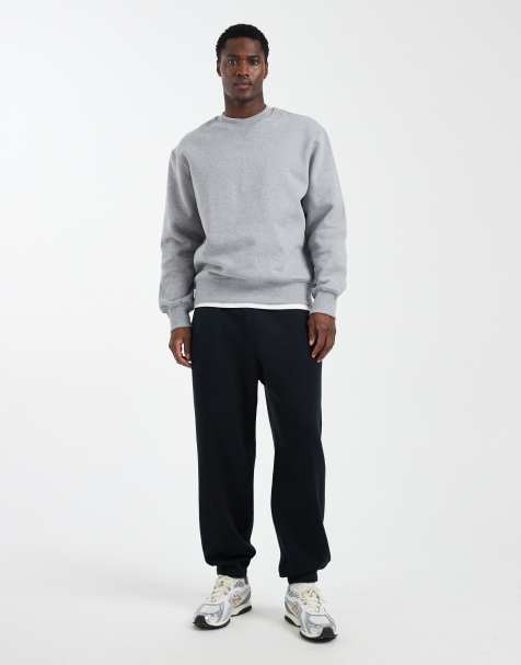 Joggers negros básicos holgados con bajos ajustados de Hollister - view 1