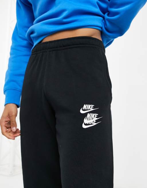 Joggers negros con bajos ajustados y estampado gráfico World Tour Pack de Nike , 3 de 4