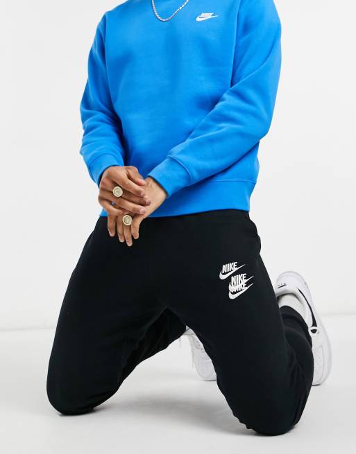 Joggers negros con bajos ajustados y estampado gráfico World Tour Pack de Nike , 4 de 4