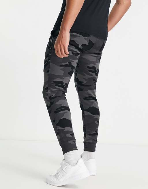 Joggers negros con cinta del logo en el lateral de Hollister, 3 de 4