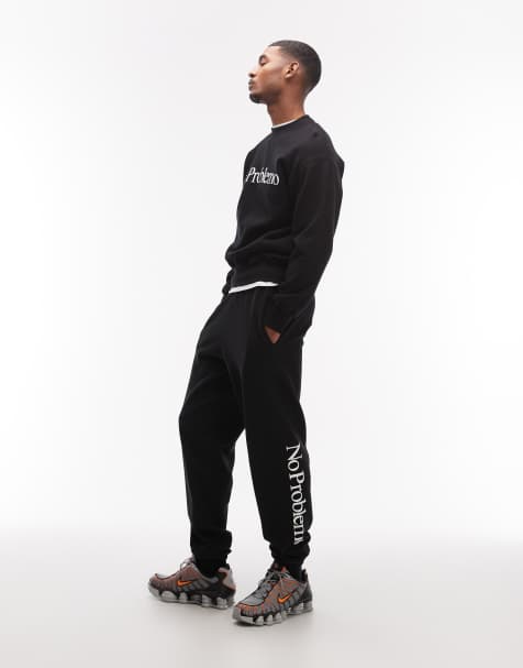 Joggers negros con logo de No Problemo (parte de un conjunto) - view 1
