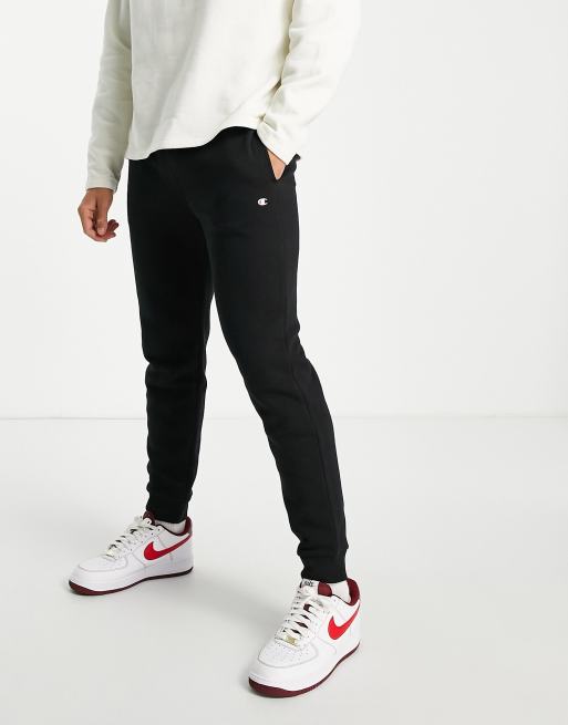 Joggers negros logo pequeño de Champion | ASOS