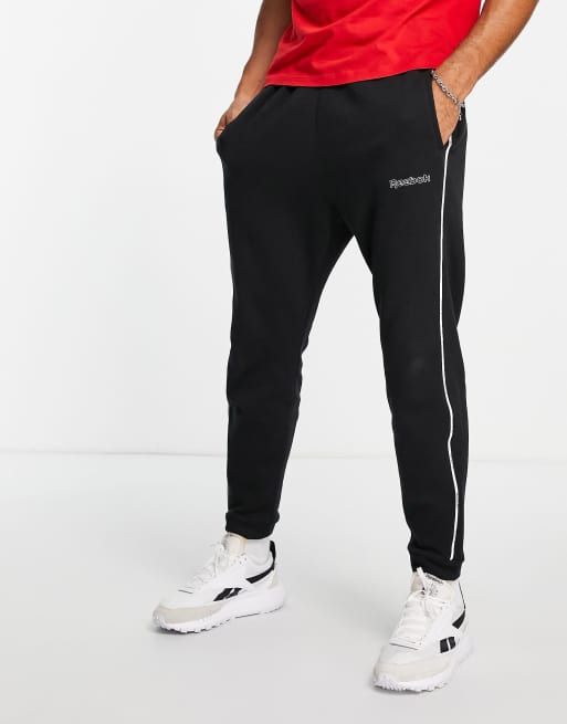 Joggers negros con ribetes y logo de Reebok Classics, 2 de 4