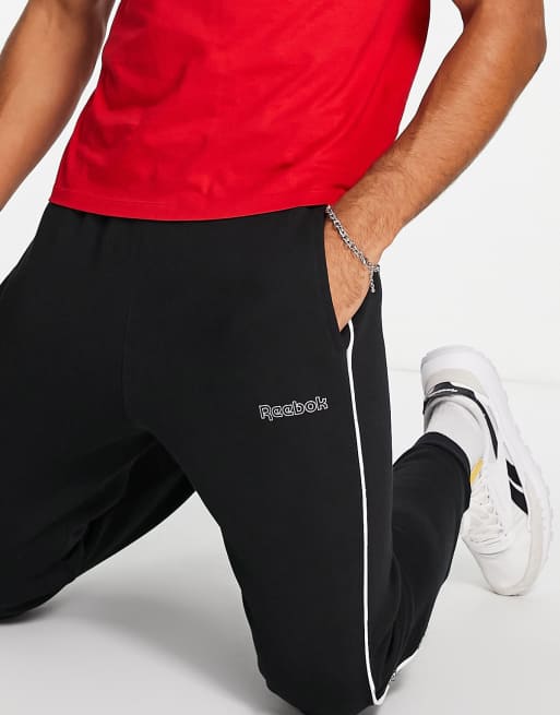 Joggers negros con ribetes y logo de Reebok Classics, 3 de 4