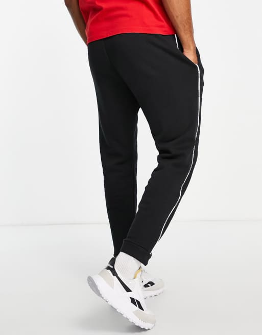 Joggers negros con ribetes y logo de Reebok Classics, 4 de 4
