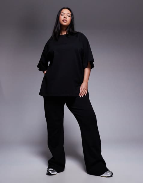 Joggers negros de corte acampanado de punto entrelazado de ASOS DESIGN Curve (parte de un conjunto) - view 1