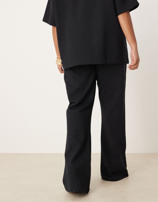 Joggers negros de corte acampanado de punto entrelazado de ASOS DESIGN Curve (parte de un conjunto), 4 de 5