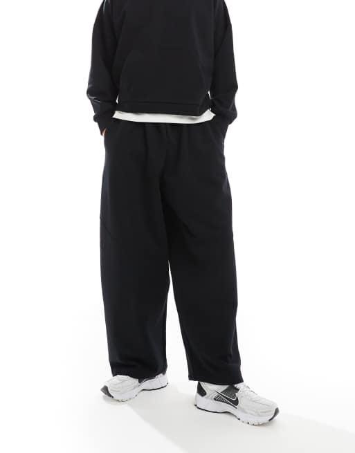 Joggers negros de corte bombacho extragrande con detalle de costuras de tejido grueso de ASOS DESIGN (parte de un conjunto)
