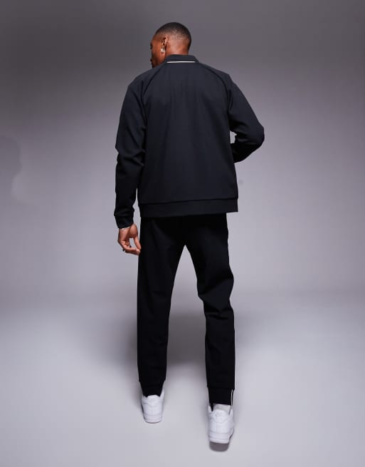 Joggers negros de corte estándar con bajos ajustados Hadiko de BOSS Green (parte de un conjunto), 2 de 5
