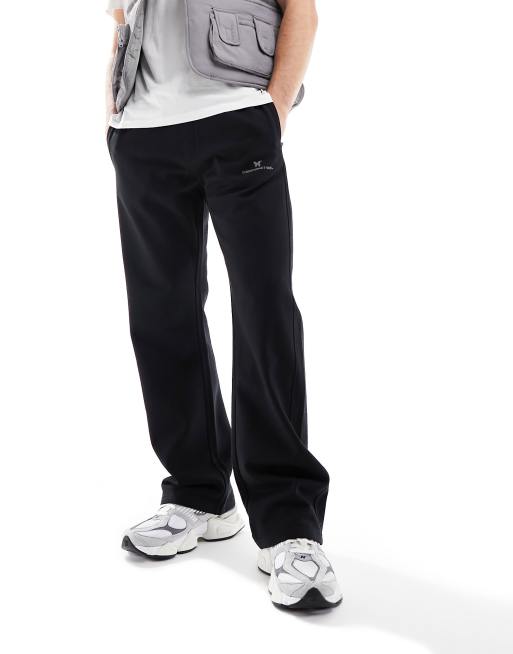 Joggers negros de corte estándar con detalle de la marca de Good For Nothing Nothing