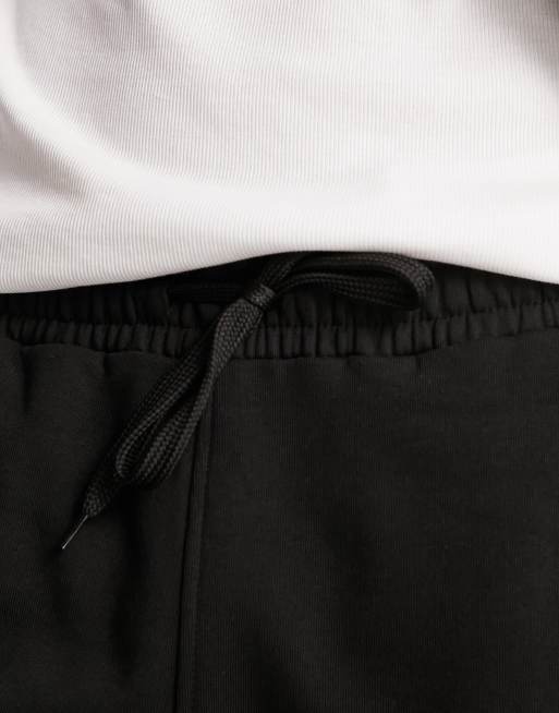 Joggers negros de corte estándar de felpa de The North Face, 3 de 4