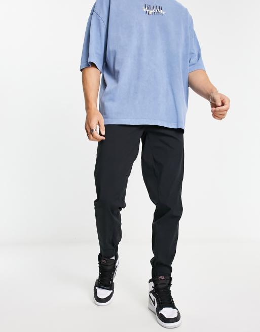 Joggers negros de corte slim Theran de Berghaus