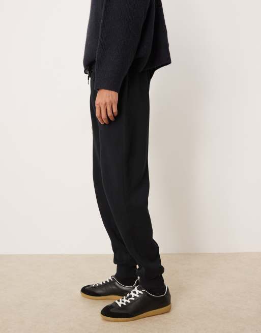 Joggers negros de corte tapered con bajos ajustados de ASOS DESIGN, 3 de 5