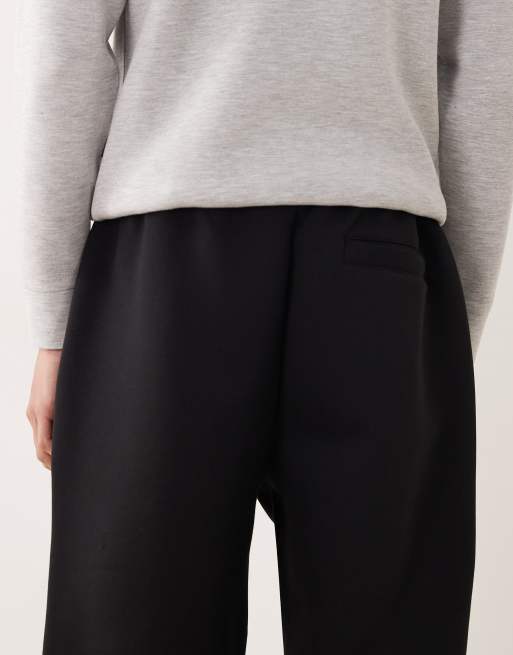 Joggers negros de corte tapered de tejido grueso efecto neopreno de ASOS DESIGN, 5 de 5