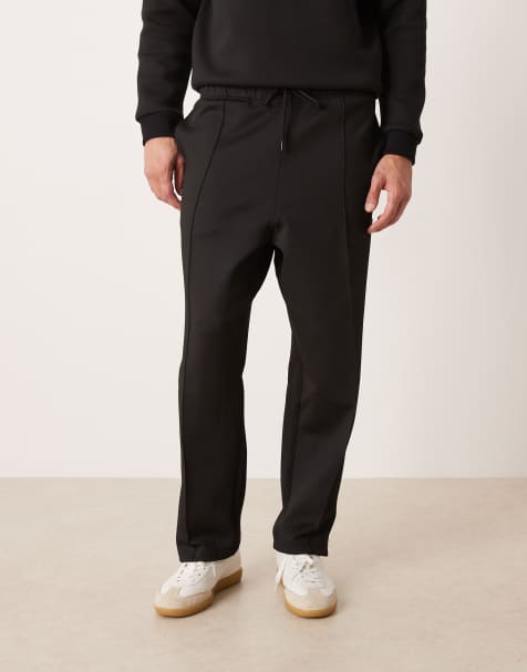 Joggers negros de corte tapered holgado con pinzas de ASOS DESIGN (parte de un conjunto) - view 1