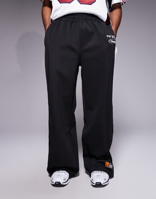 Joggers negros de estilo retro de pernera recta con botones de presión de AND1, 2 de 5