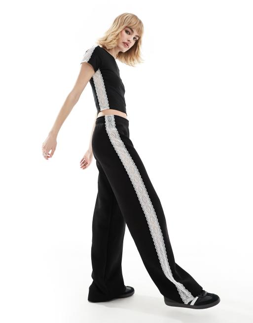 Joggers negros de pernera ancha con encaje en contraste de ASOS DESIGN (parte de un conjunto)
