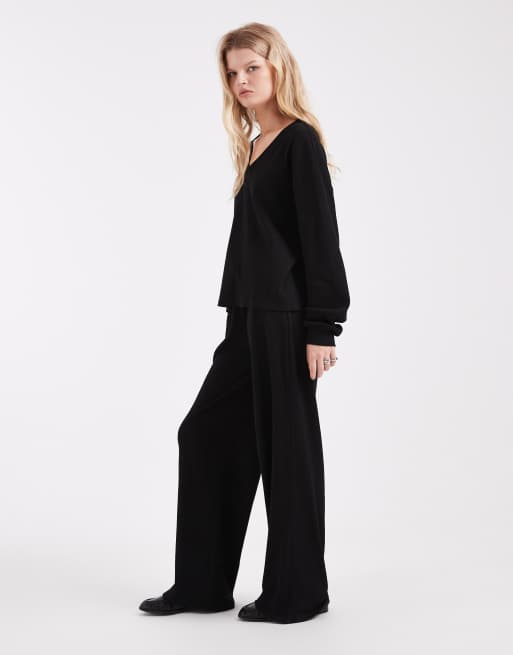 Joggers negros de pernera ancha de canalé de ASOS DESIGN (parte de un conjunto), 4 de 5