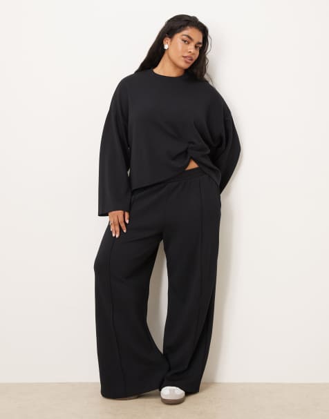 Joggers negros de pernera ancha de cupro suave al tacto de ASOS DESIGN Curve - view 1