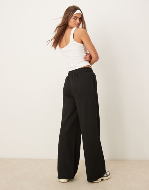 Joggers negros de pernera ancha y estilo deportivo de estar por casa de Urban Threads, 3 de 5
