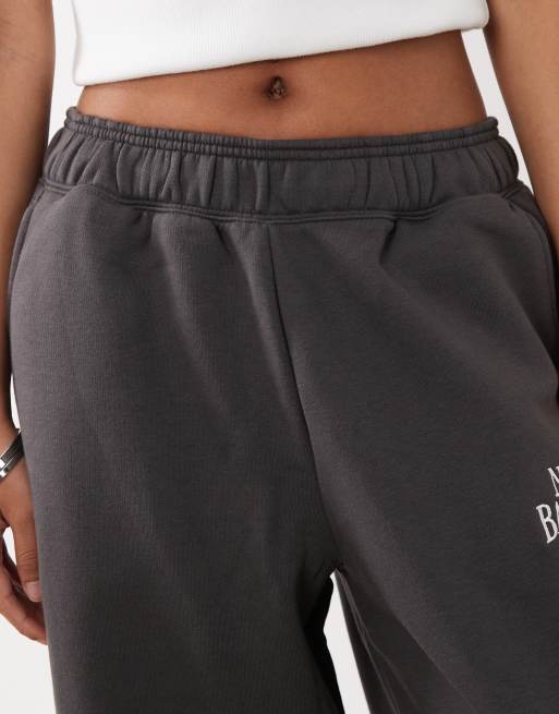Joggers negros de pernera barrel de felpa Trackside de New Balance, 3 de 5