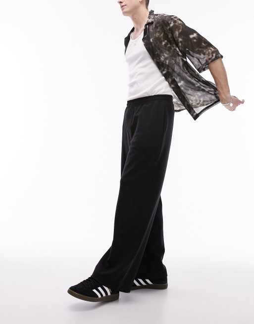 Joggers negros de pernera holgada con caída de Topman, 2 de 5