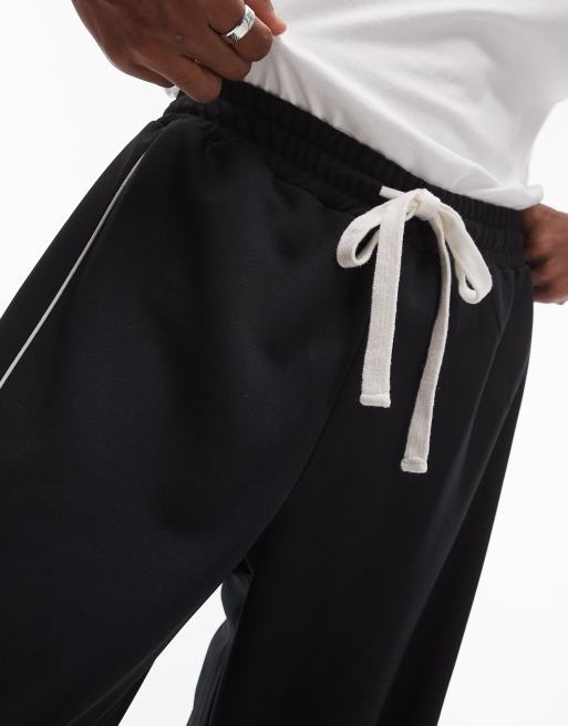 Joggers negros de pernera holgada con ribetes dobles en los laterales de Topman (parte de un conjunto), 3 de 5