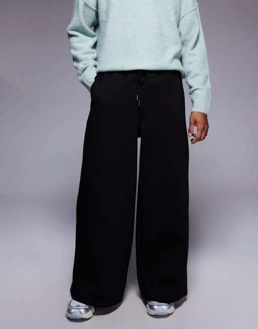 Joggers negros de pernera muy ancha de tejido efecto neopreno de ASOS DESIGN