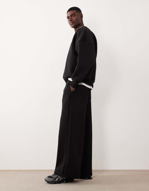 Joggers negros de pernera muy ancha de tejido grueso efecto neopreno de ASOS DESIGN, 3 de 5