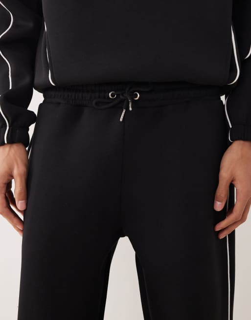 Joggers negros de pernera recta con ribetes laterales de tejido grueso efecto neopreno de ASOS DESIGN, 5 de 5