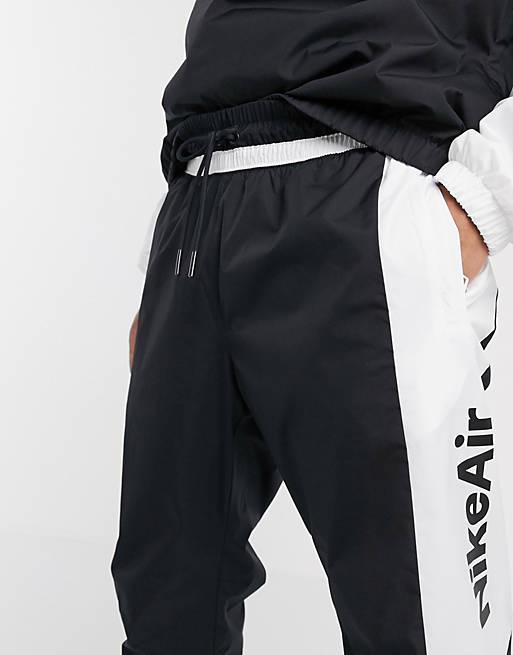 soporte paralelo Abstracción Joggers negros de tejido con bajo ajustado Air de Nike | ASOS