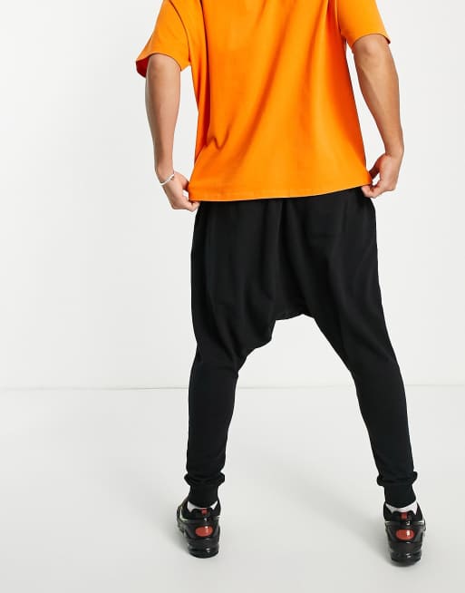 Joggers negros de tiro caído en tejido ligero de ASOS DESIGN, 2 de 4