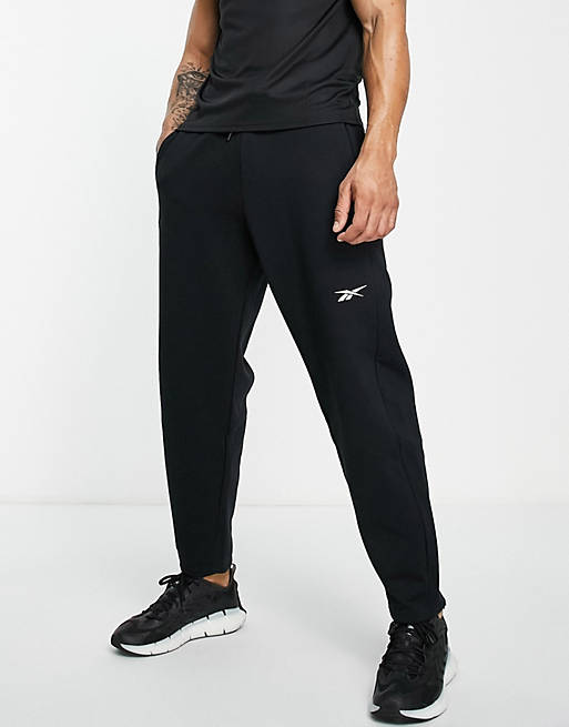 Hombre Pantalones y mallas | Joggers negros Dreamblend de Reebok Training - EZ02988
