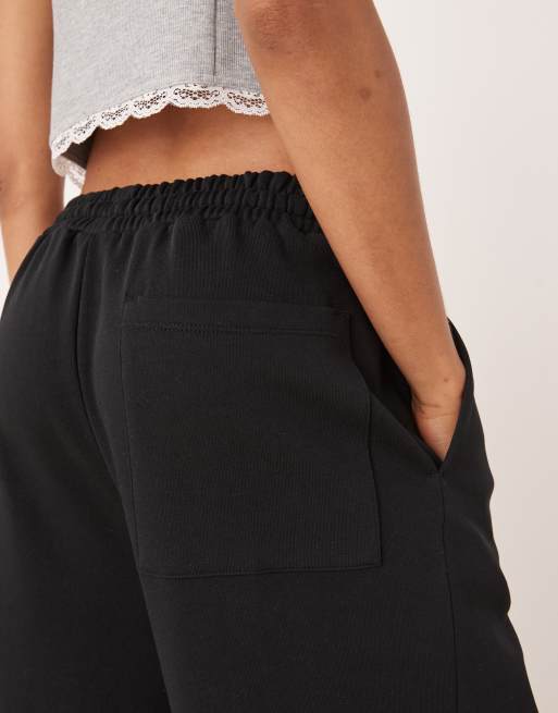 Joggers negros extragrandes con detalle de dobladillos vueltos de ASOS DESIGN Tall, 2 de 5