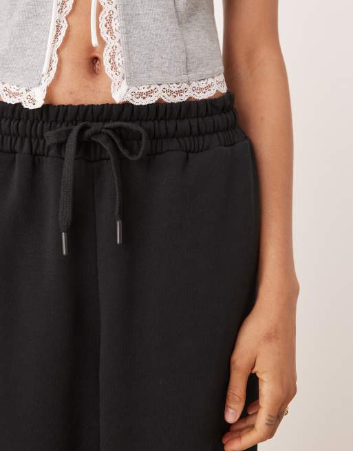 Joggers negros extragrandes con detalle de dobladillos vueltos de ASOS DESIGN Tall, 4 de 5