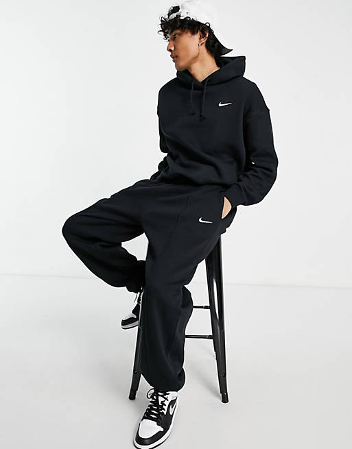 Hombre Pantalones y mallas | Joggers negros extragrandes de felpa Trend de Nike - QM42258