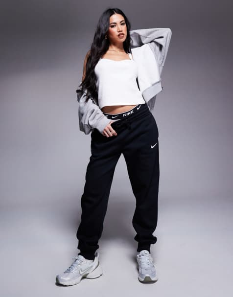 Joggers negros extragrandes de talle medio Phoenix Fleece de Nike - view 1