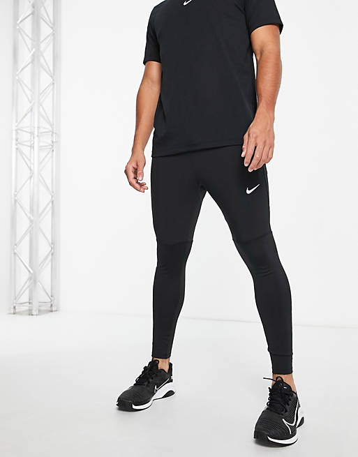 Hombre Pantalones y mallas | Joggers negros Hybrid Dri-FIT UV Challenger de Nike Running - YG84005