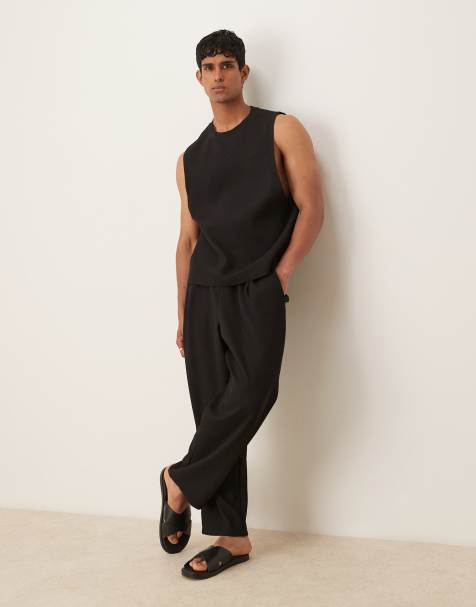 Joggers negros plisados de corte tapered holgado de ASOS DESIGN - view 1