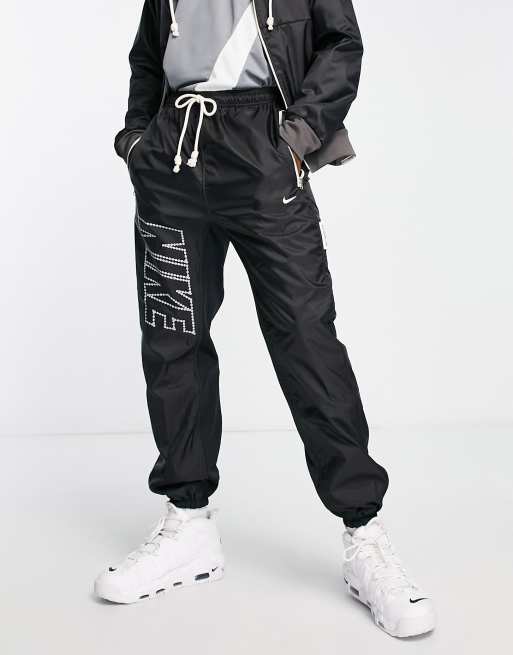 Joggers negros Seasonal Exploration Standard Issue Therma-FIT de Nike Basketball