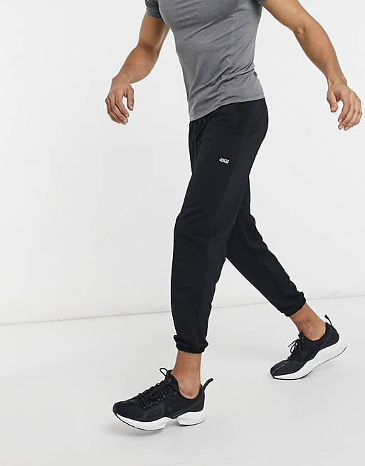 Hombre Pantalones y mallas | Joggers negros tapered deportivos con logo de ASOS 4505 - YB40593