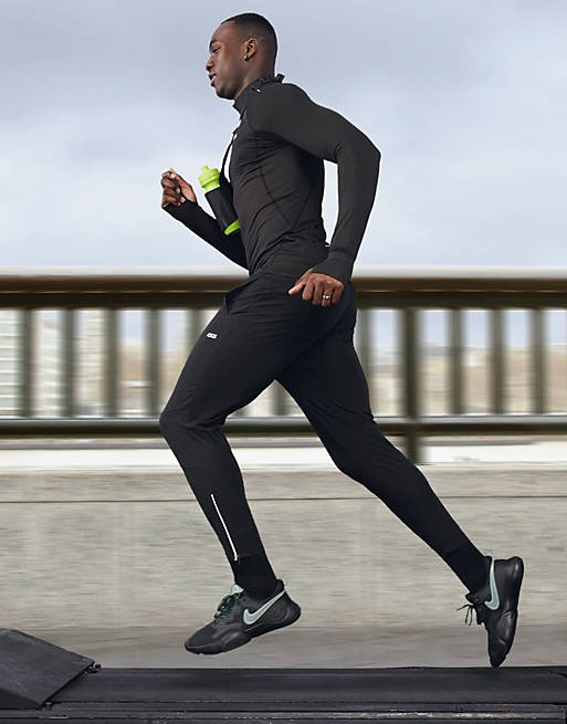 Joggers para correr de corte pitillo tapered con cremalleras reflectantes de tejido de punto de ASOS 4505