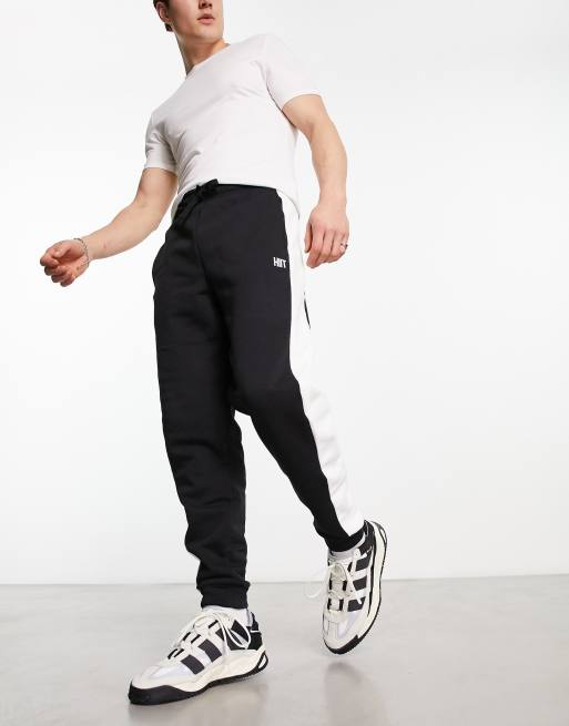 Joggers pitillo con diseño color block de HIIT