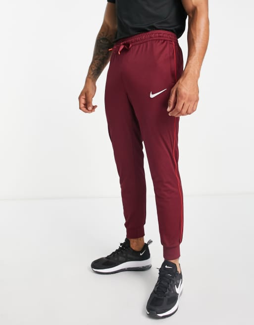 Joggers rojo oscuro FC Libero DriFIT de Nike Football ASOS