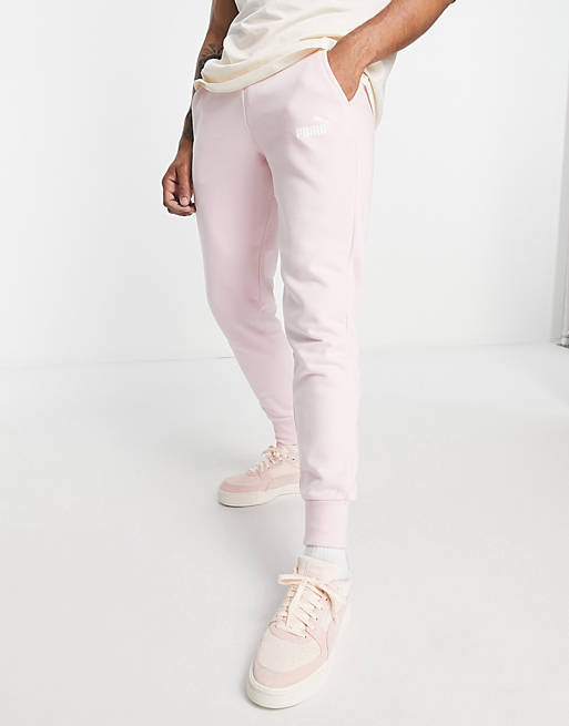 Hombre Pantalones y mallas | Joggers rosa tiza con logo pequeño de PUMA Essentials - LG15970