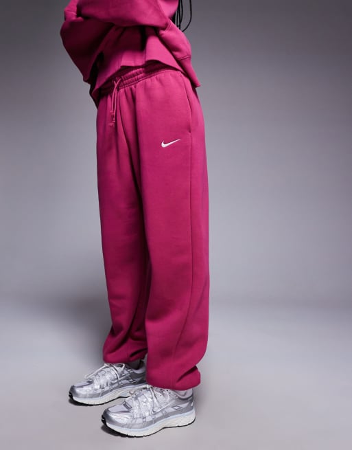 Joggers rosas extragrandes de talle alto con bajos ajustados Phoenix Fleece de Nike , 2 de 5