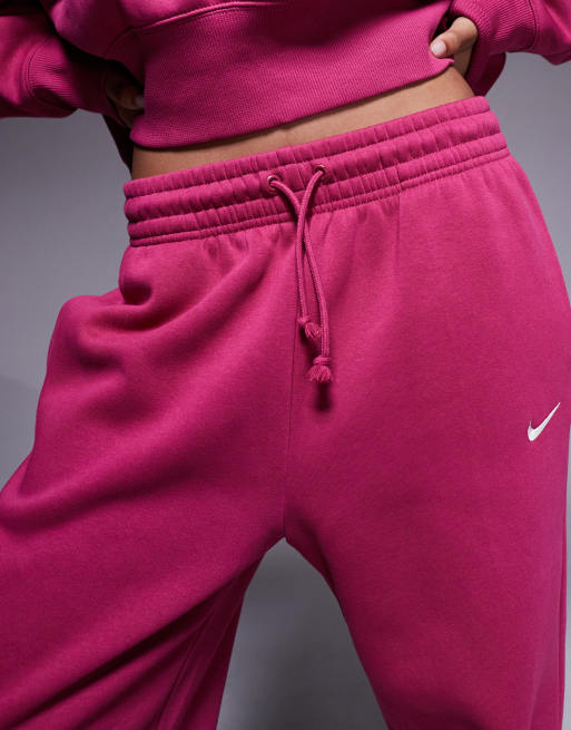 Joggers rosas extragrandes de talle alto con bajos ajustados Phoenix Fleece de Nike , 3 de 5