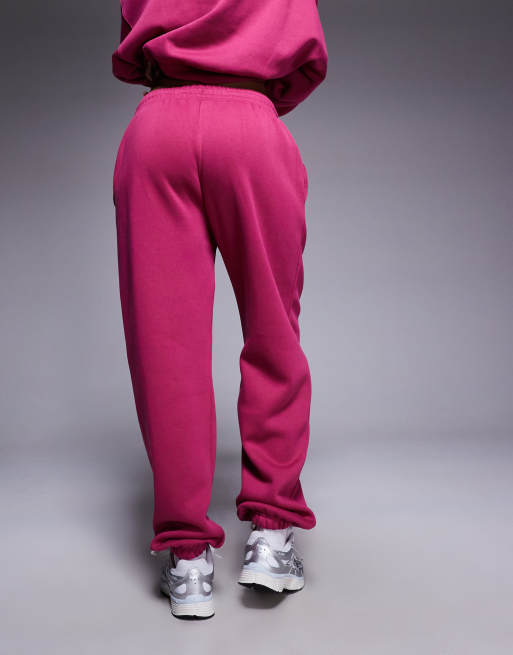 Joggers rosas extragrandes de talle alto con bajos ajustados Phoenix Fleece de Nike , 5 de 5