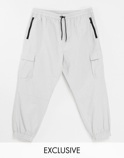 Joggers técnicos de corte holgado color piedra de New Look