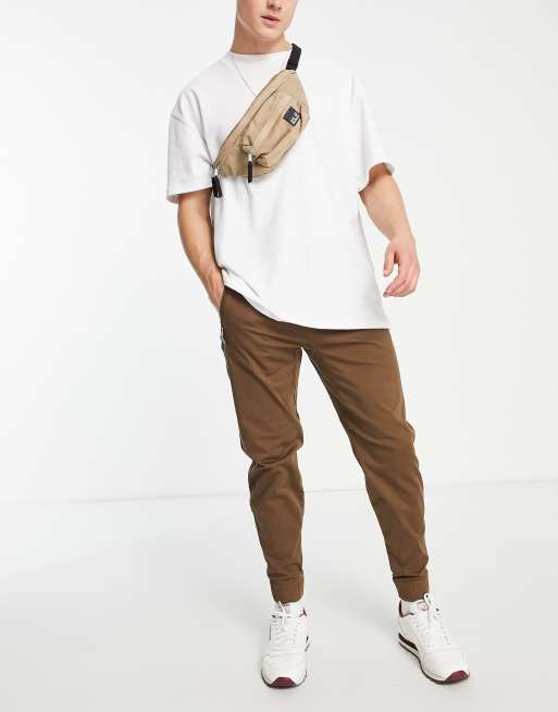 Joggers tostados cargo de corte pitillo con bolsillos de Hollister